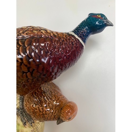 6 - Beswick, a Beswick cock and hen pheasant group figure, model no. 2078. Height 17.5cm.