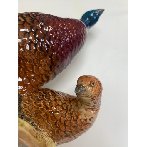 6 - Beswick, a Beswick cock and hen pheasant group figure, model no. 2078. Height 17.5cm.