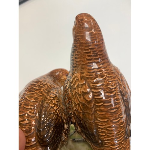 8 - Beswick, a Beswick pair of Partridges, model no. 2064. Height 15.5cm.