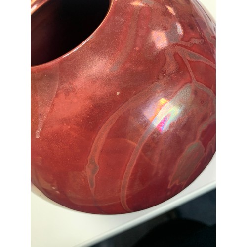 363 - A red Lustre ware hand painted vase, with hanging fruit decoration marked directly into the glaze. S... 