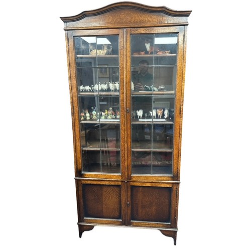 449 - Glazed display cabinet with two doors and 2-door cupboard below, width 90cm, depth 30cm, height 190c... 