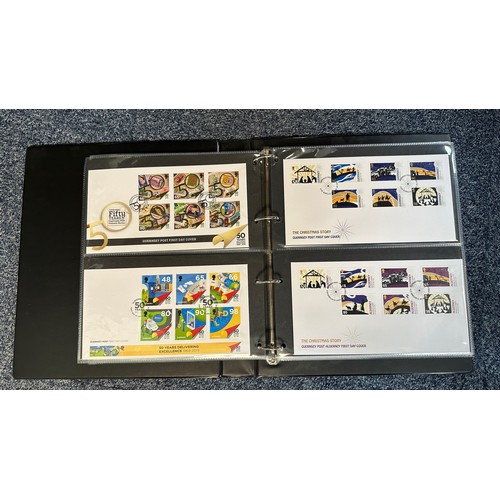 138 - Guernsey and Alderney - 1969-2022 (May) First Day Cover collection in nine volumes, huge original fa... 