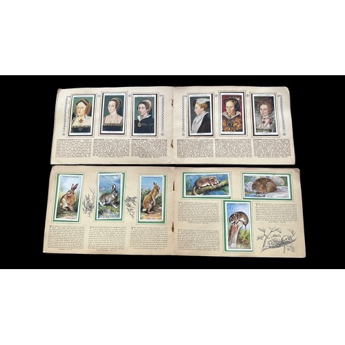 196 - Collection of cigarette cards, in 4 albums (all in plastic sleeves) and in old penny albums and simi... 