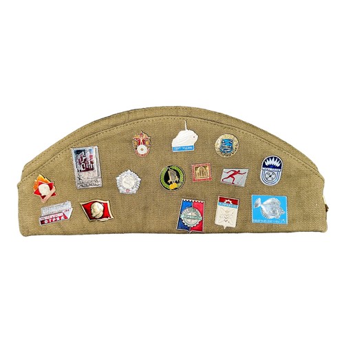 114 - Soviet Beret with selection of Soviet Pin Badges attached, total quantity of badges 32.