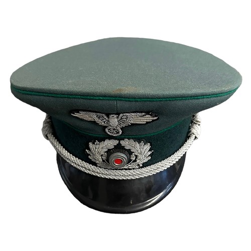 115 - German Second World War visor cap, J.G. Schmidt jun Söhne label attached to interior.