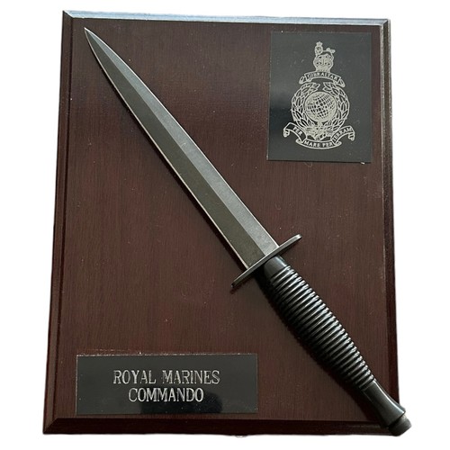 143 - Royal Marines Commando display board featuring a Fairbairn & Sykes style Commando fighting knife aff... 