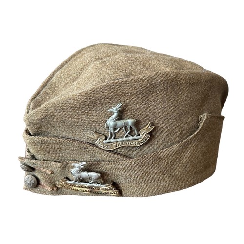 132 - Royal Warwickshire 1st Birmingham Battalion Field Service Cap, with two cap badges attached for Roya... 