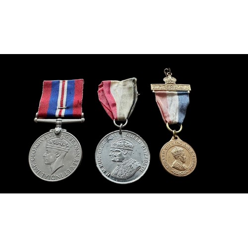 33 - Small selection of Medals & Badges to include; 1939-45 Medal, Silver ARP badge (x2), Silver AFS badg... 