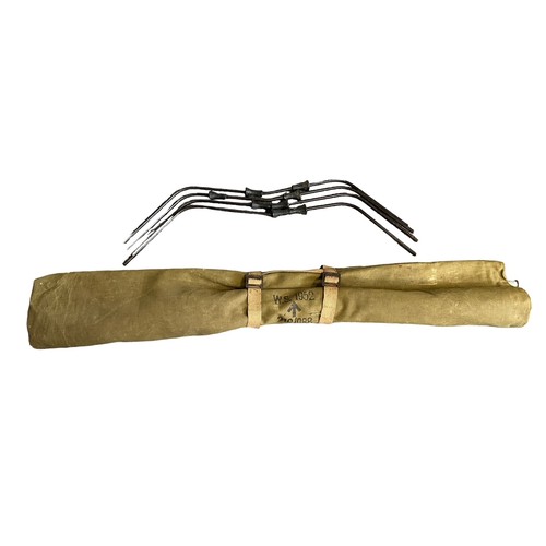 150 - 1952 Olive Green metal & canvas military camp bed marked W.S. 1952 21G/288, a khaki military backpac... 