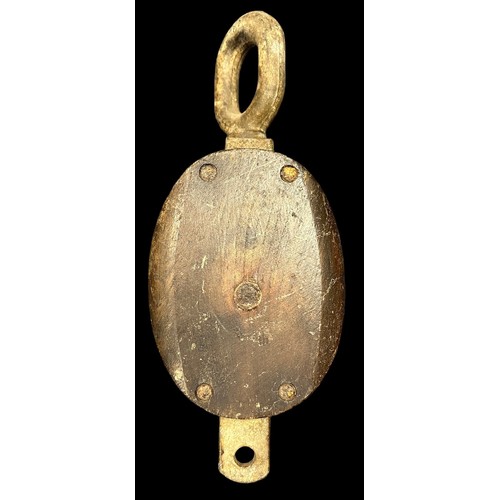 159 - Navy, a large ship’s wooden pulley, with cast metal loop to one end, loop marked SWL 1. SOTON J4 281... 