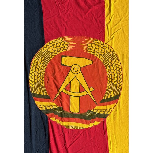 162 - East Germany, very large East Germany fabric flag, stitched design with attached round insignia. The... 