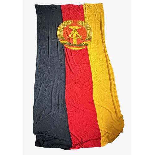 162 - East Germany, very large East Germany fabric flag, stitched design with attached round insignia. The... 