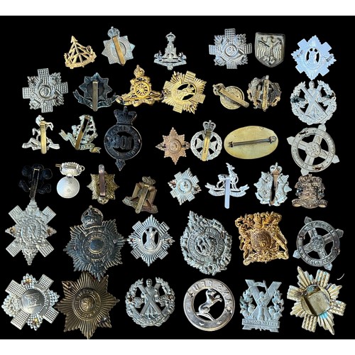 166 - Mixed lot of military cap badges etc (40), with examples of Madras Infantry, Highland Regiment, Argy... 