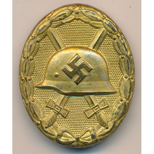 119A - German Gold Wound Badge. Non maker marked, hollow type with working catch and pin to reverse.