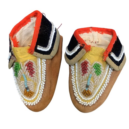 203 - A small pair of Native American bead and hide Moccasins, early 20th Century, Floral beadwork pattern... 