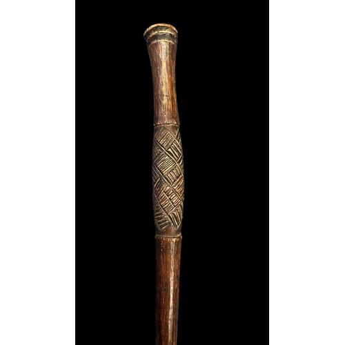 194A - African long spear with iron long leaf spear head, wooden shaft with carved design to base, twisted ... 