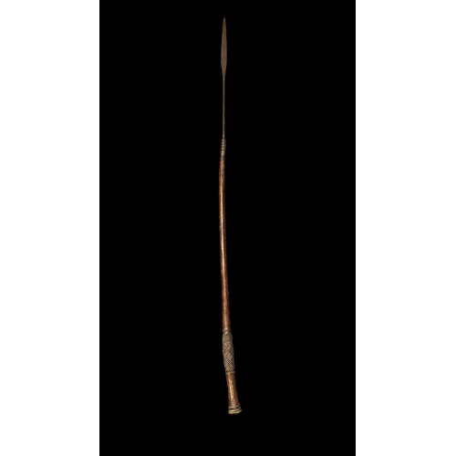 194A - African long spear with iron long leaf spear head, wooden shaft with carved design to base, twisted ... 