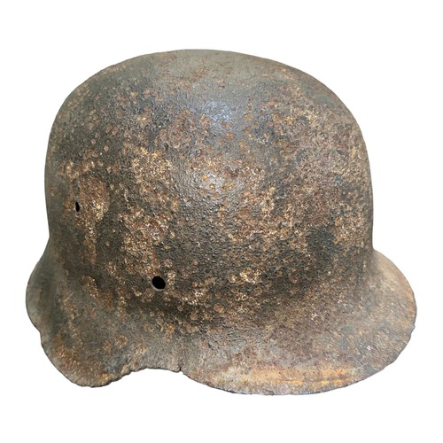 118A - Second World War Third Reich Waffen SS Helmet in relic condition, SS Decal very faint . Perforations... 