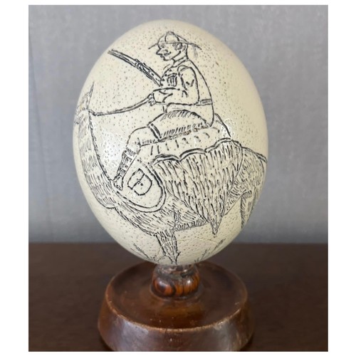 98 - Boer War Trench Art, hand painted commemorative Ostrich egg painted with soldier riding an Ostrich t... 