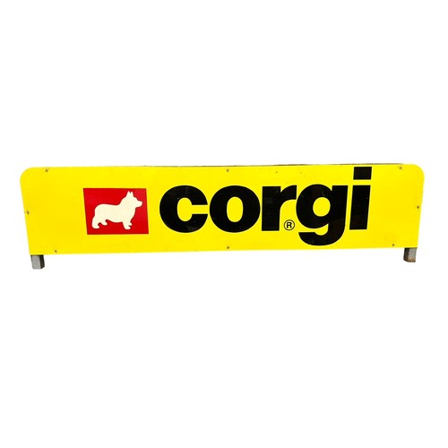 53 - Corgi. 1980's onwards Shop Display Sign, generally good plus, approx. size: W103cm x H26cm. BUYER MU... 