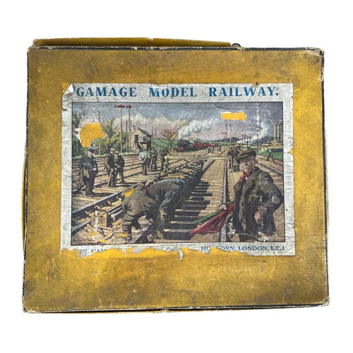 283 - Bing for Gamages. Tinplate 2-rail clockwork set No. 61/3600/5, generally excellent to good in good y... 