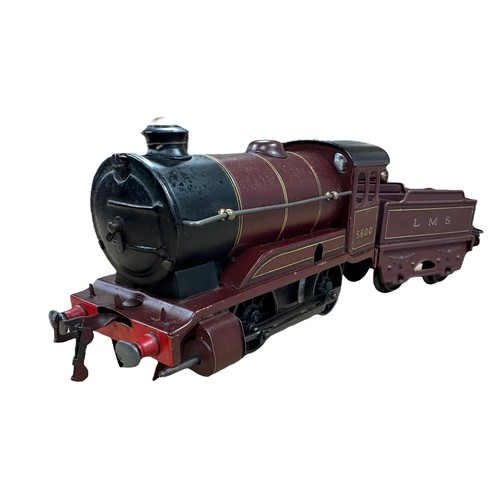 348 - Hornby O gauge clockwork with key LMS 5600 0-4-0T locomotive and LMS tender, generally excellent to ... 