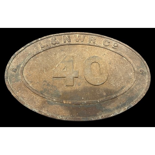 259 - L&NWR Company bridge plate No. 40 and lamp, good (surface corrosion). Contents unchecked for complet... 