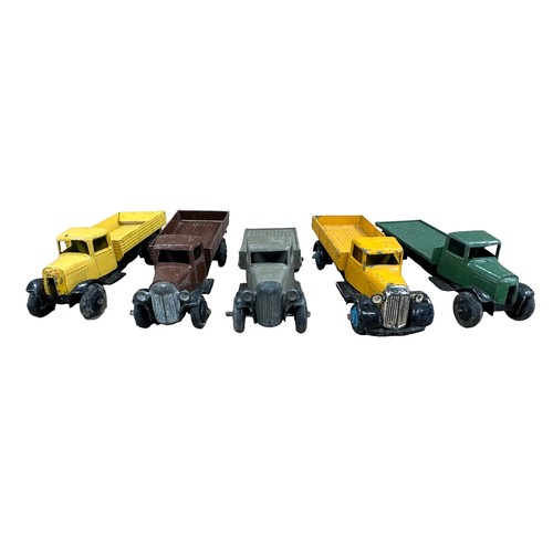 80 - Dinky post war 25 series lorries, generally good plus to good,  with Flat Truck (3) and Flatbed Open... 