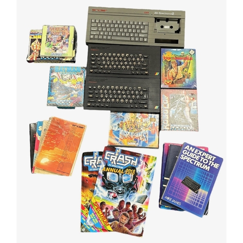 236 - A ZX spectrum +2, 2x ZX Spectrum+ keyboards. With 60+ games, user guides, reference books and Spectr... 