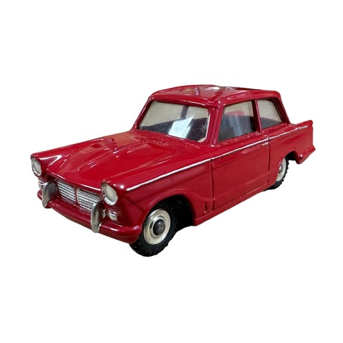 115 - Dinky Triumph Herald red with silver lining, without interior No. 189, special issue for Standard-Tr... 