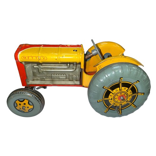 243A - Mettoy red & yellow tinplate tractor.