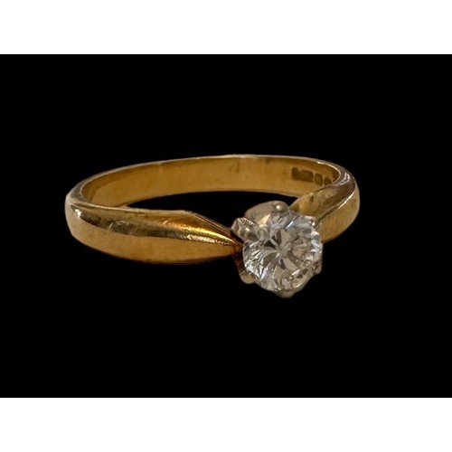 40 - An approx  0.33 diamond set in 18ct gold ring.  Size M. Total weight 3.22g. Birmingham hallmarks.

P... 