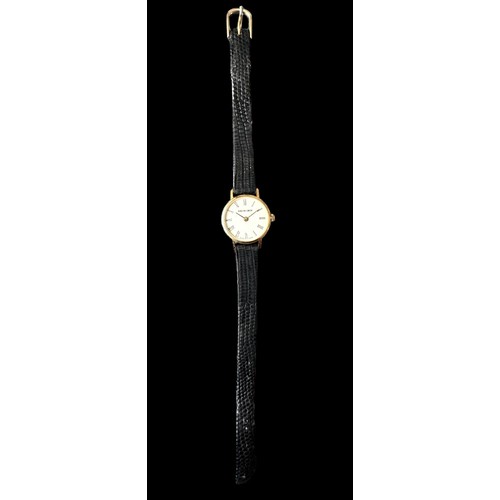 122 - A Bueche Girod Swiss-made 9ct gold ladies wristwatch, white dial with Roman numerals and black strap... 