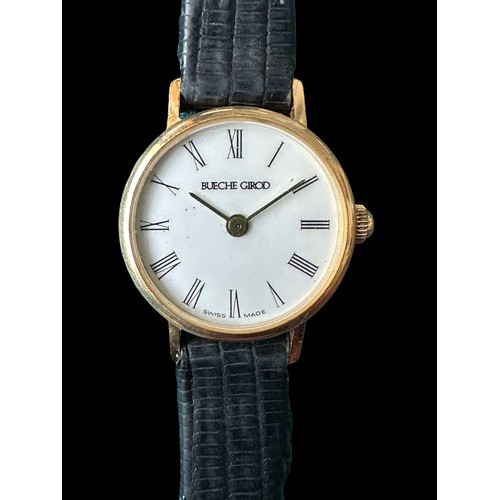 122 - A Bueche Girod Swiss-made 9ct gold ladies wristwatch, white dial with Roman numerals and black strap... 