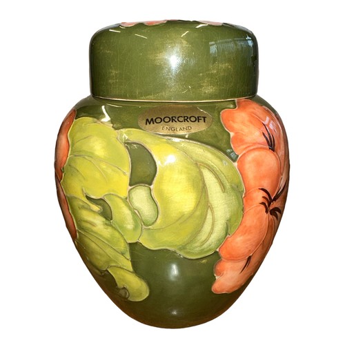 196 - Moorcroft – A Moorcroft Hibiscus pattern ginger jar, WM painted initials and Made in England imprint... 