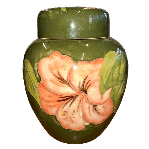 196 - Moorcroft – A Moorcroft Hibiscus pattern ginger jar, WM painted initials and Made in England imprint... 