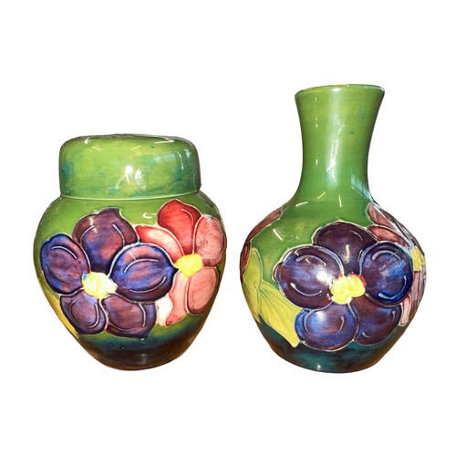 199 - Moorcroft – A Moorcroft Clematis pattern pair of items to include a small vase, impressed Moorcroft ... 