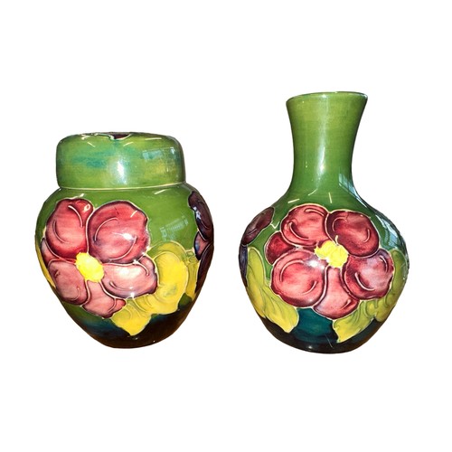 199 - Moorcroft – A Moorcroft Clematis pattern pair of items to include a small vase, impressed Moorcroft ... 