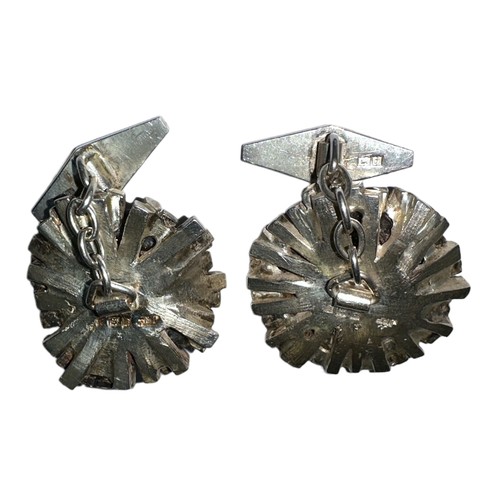 95 - Pair of sterling silver cufflinks with quartz centre, total weight 28g.

Please see the buyer's term... 