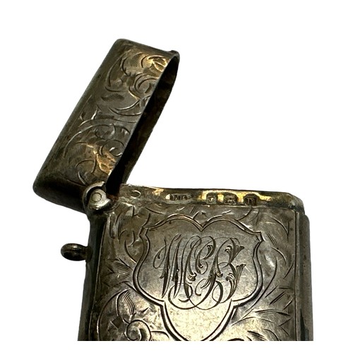 142 - Hallmarked silver vesta case, engraved, with WHH Birmingham hallmark.