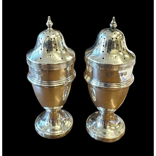 136 - Boxed pair of Barker Brothers silver Pepperettes (Pepper Shakers). Held in presentation case. Each h... 