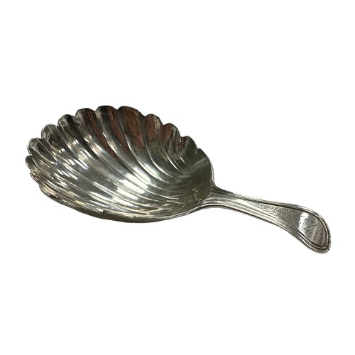 139 - George III Silver caddy spoon, shell shaped bowl with curved handle with worn initials engraved to h... 