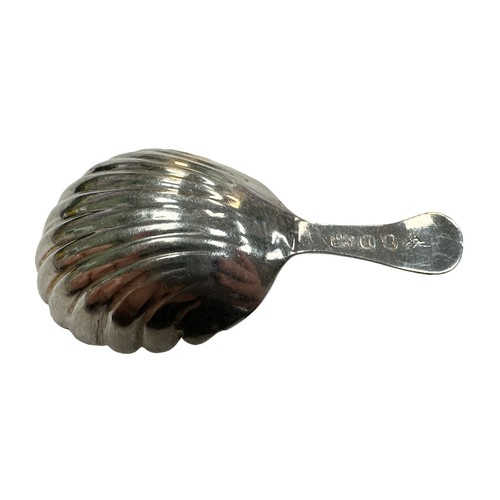 139 - George III Silver caddy spoon, shell shaped bowl with curved handle with worn initials engraved to h... 