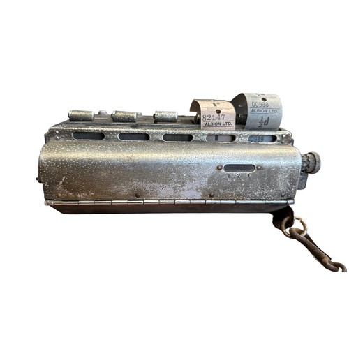 338 - Automaticket Ltd London bus ticket machine, housed in tin with partially attached leather strap. ‘Ul... 