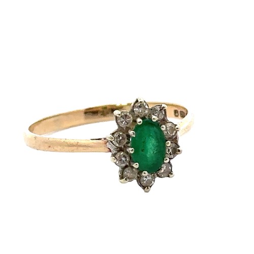 24 - A 9ct gold emerald and diamond cluster ring, size Q. Oval emerald 6mm x 4mm.  Ring weight 1.62g.

Pl... 