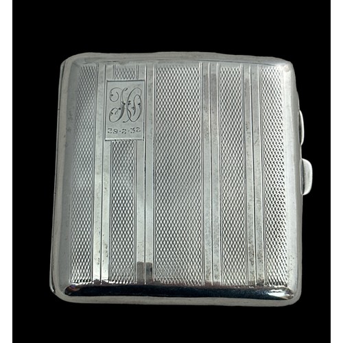 143 - A square silver cigarette case, approx 8cm x 8cm.  Birmingham hallmarks for Deykin & Harrison, 1929.