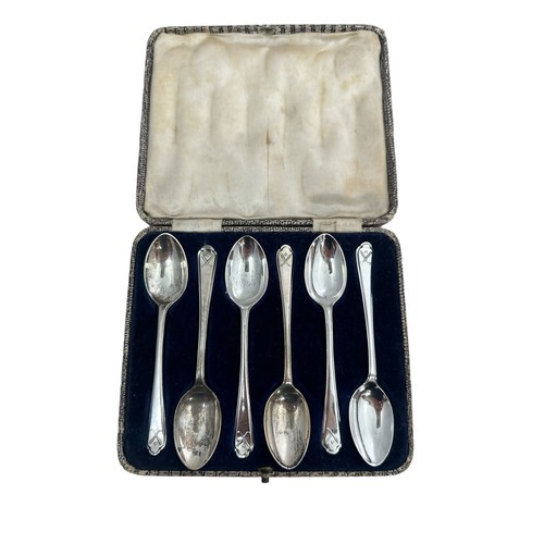 145 - A cased set of six silver spoons. 1933 Sheffield Walker & Hall.