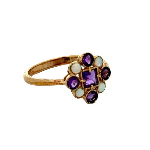 66 - A 9ct gold amethyst and opal cluster ring, size Q.  Birmingham hallmarks. Weight 2.4g.
Please see th... 