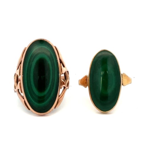 67 - Two oval cabochon cut malachite rings, both size P and set in hallmarked 9ct gold. Large malachite a... 