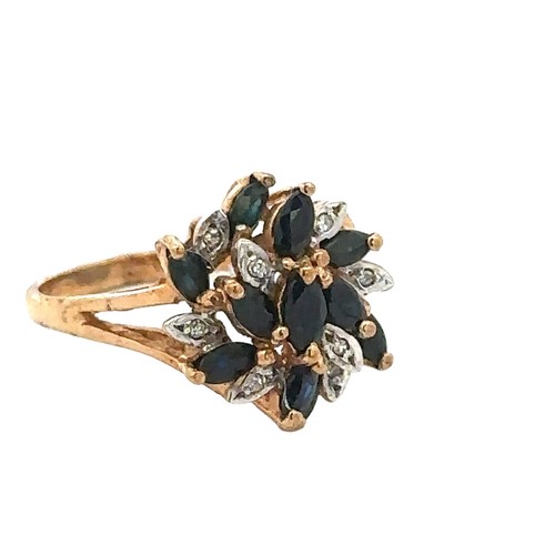 54 - A sapphire and diamond flower cluster ring, set in 9ct gold. Size P. Weight 3.41g.

Please see the b... 